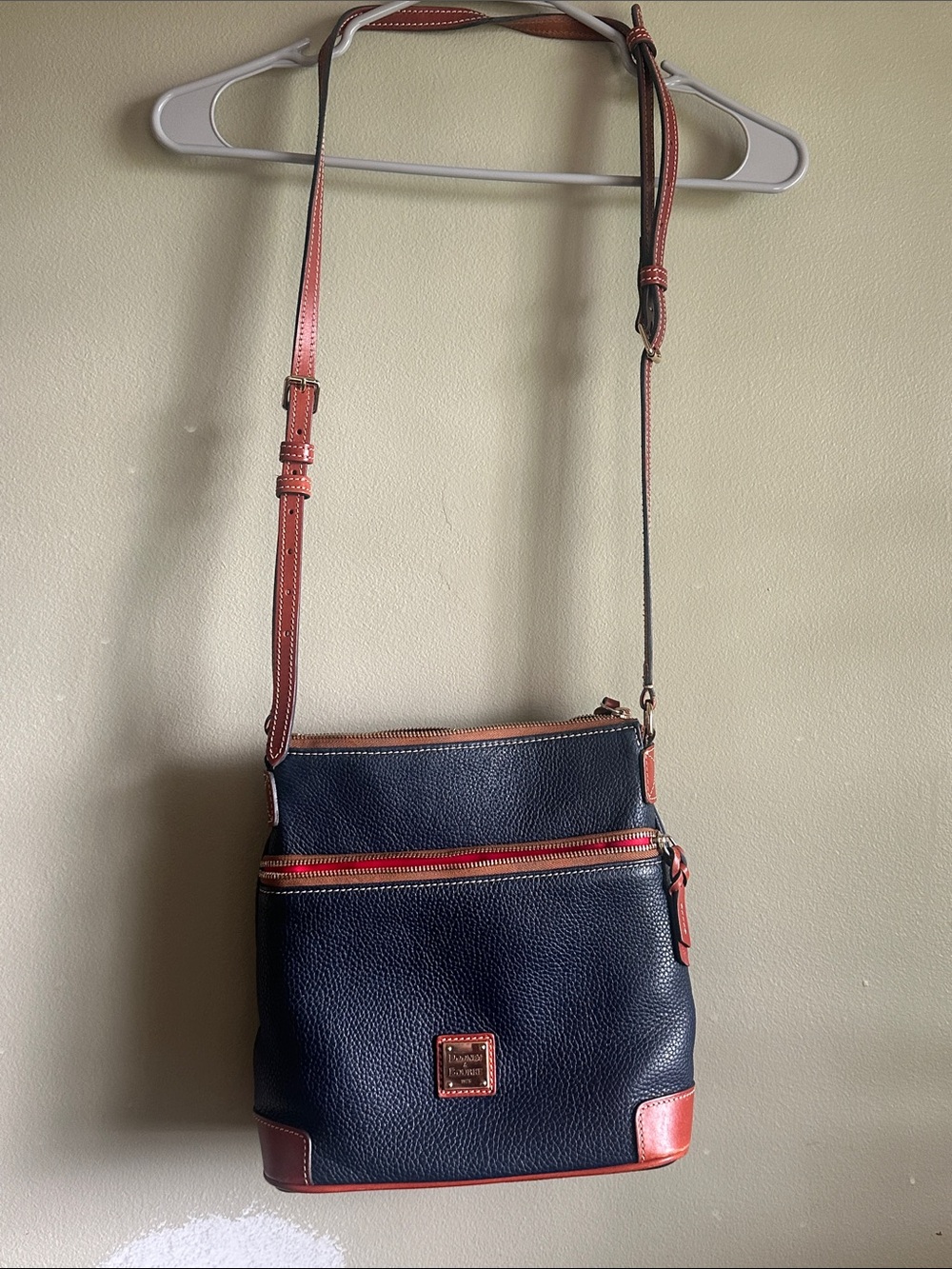 Dooney & Bourke Navy Pebbled Leather Crossbody with Brown and Red Trim